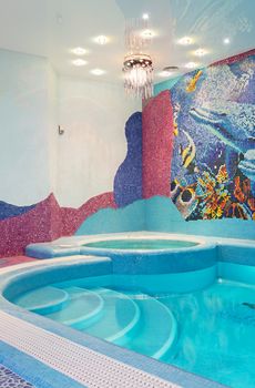 Luxury swimming pool design with mosaic tile