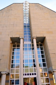 Gaumaise stone facade with four columns and the glazed center