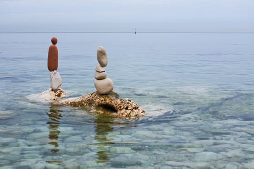 Zen balanced stones on the water