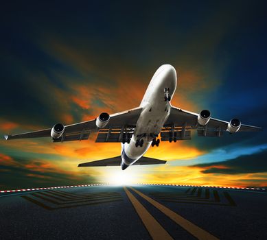 passenger plane take off from runways against beautiful dusky sky with copy space use for air transport ,journey and traveling industry business