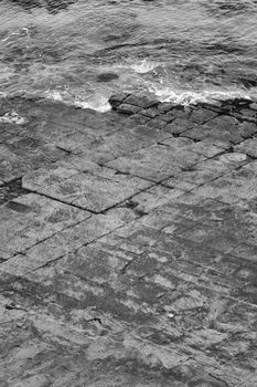 View of Tessellated Pavement in Pirates Bay, Tasmania. Black and White.