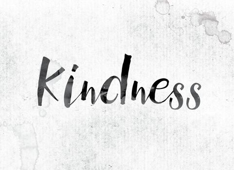 The word "Kindness" concept and theme painted in watercolor ink on a white paper.