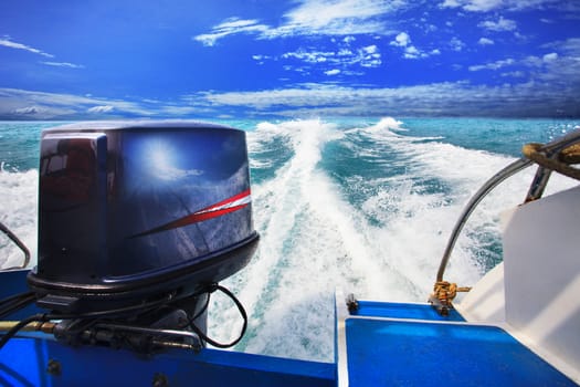 rear view from speed boats running against clear sea blue water beautiful blue sky outdoor location use for traveling and nature destination theme