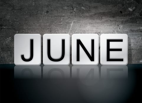 The word "June" written in white tiles against a dark vintage grunge background.