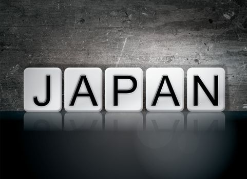 The word "Japan" written in white tiles against a dark vintage grunge background.