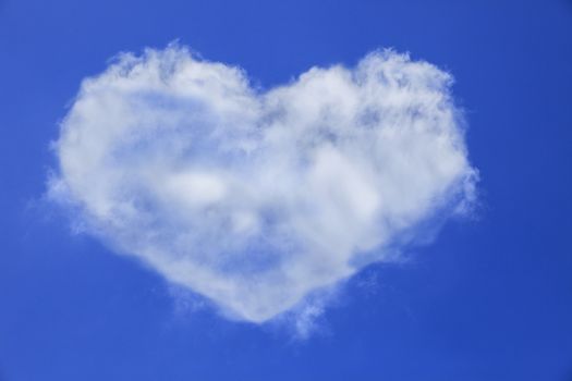 heart shape of white cloud on blue sky use for multipurpose natural  background or backdrop