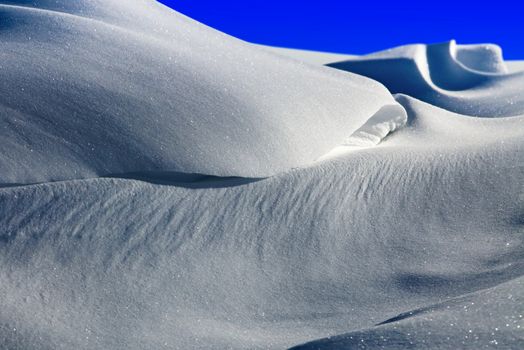 background of winter snow, shiny snowflake