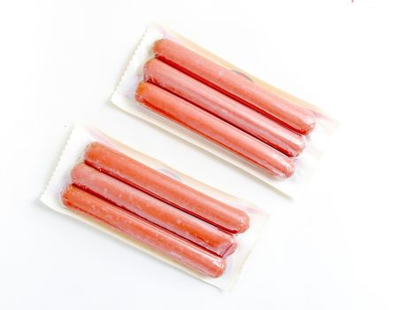 picture of a hot dog sausages on white background