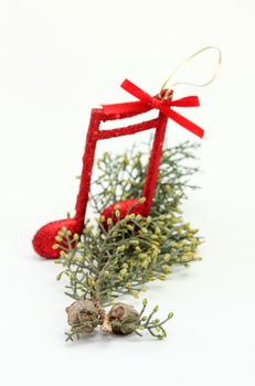 picture of a cristmas music notes decoration on a tree branch