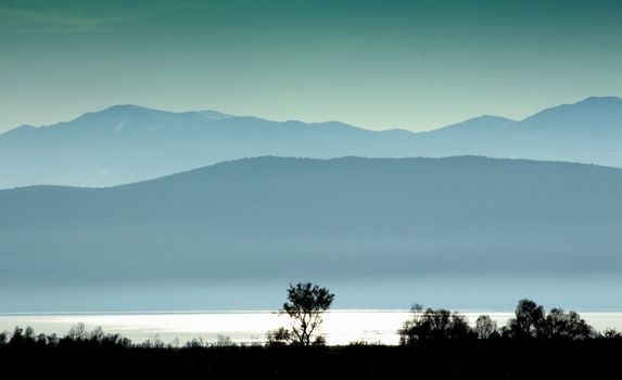 picture of a sunset on a lake prespa in macedonia