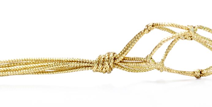 picture of a gold colored rope on white