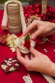 Christmas toys and decorations are handmade by women's hands