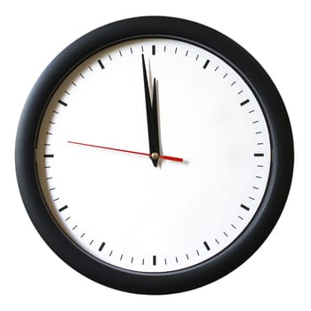 An isolated shot of a clock with one minute left to 12.