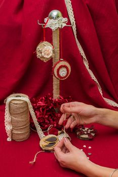 Christmas toys and decorations are handmade by women's hands