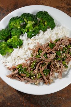 boiled beef with pungent spokes sauce garnish rice with broccoli