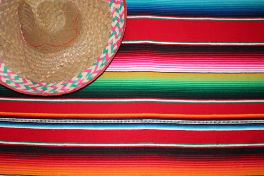 Mexico traditional cinco de mayo rug poncho fiesta background with stripes copy space