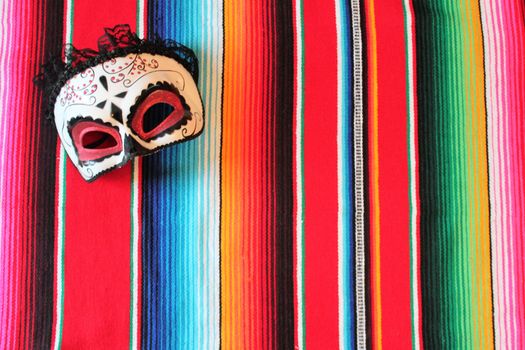 Mexico traditional cinco de mayo rug poncho fiesta background with stripes copy space