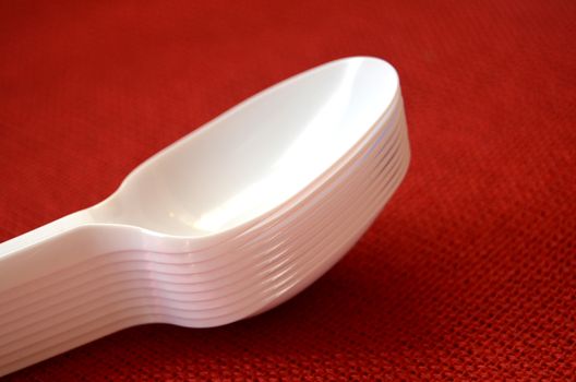 picture of a plastic disposable spoons,food concept