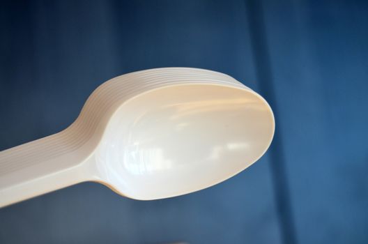 picture of a plastic disposable spoons,food concept