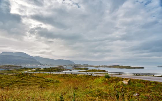 Norway cloudy summer day. Bridges to islands over fjord on Lofoten islands