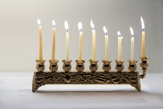 The Symbols of Hanukkah - nine-branched mehorah Hanukiah