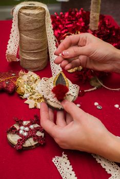 Christmas toys and decorations are handmade by women's hands