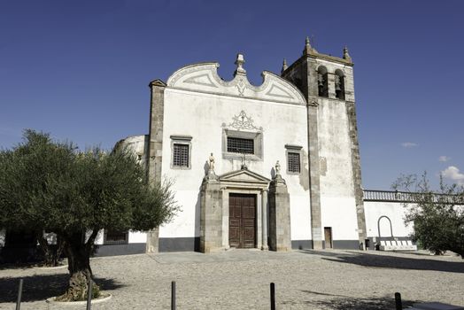 white church in moura portugal village