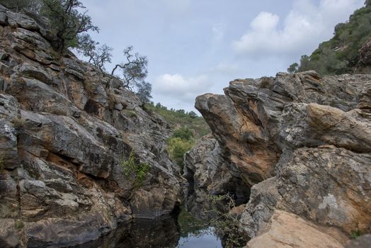 small river with pond in nature portugal near odemira called pego des pias