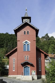 old red wooden church in the village rubeland in germany