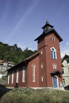 old red wooden church in the village rubeland in germany