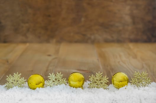 Christmas Decoration  With Snow Over Wooden Background