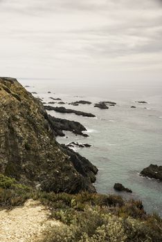 wild ocean splash water to the rocks of the west coast of Portugal