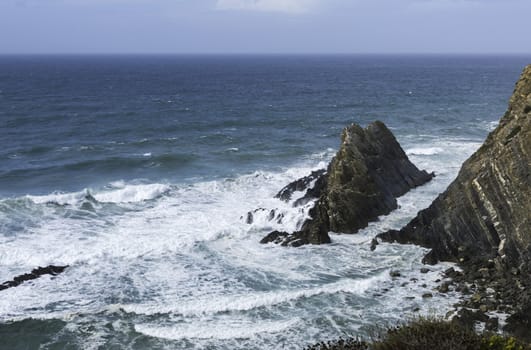 blue water near the rocks of the west coast of Portugal