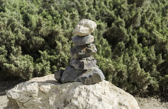 stack of stones on rock in portugal nature