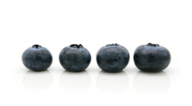 Close-up of fresh blueberry on a white background