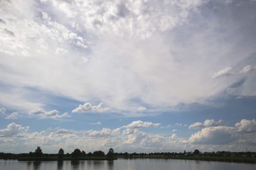 blue lake with cloudy sky, nature series