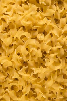 Full background of dry uncooked pasta, Food