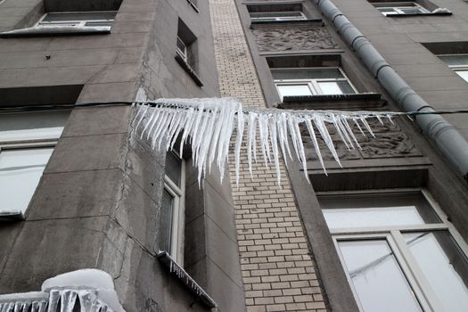 huge icicles on the wires above the head