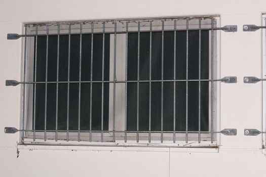 Installation of window grid of metal as protection against intruders. Security grille for windows, doors and balconies.