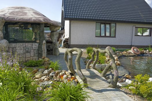 dacha with original gazebo artificial pond and greenery