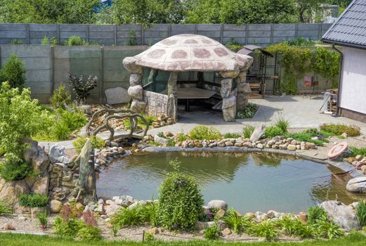 dacha with original gazebo artificial pond and greenery