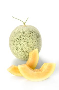 freshly cut cantaloupe melon on white background