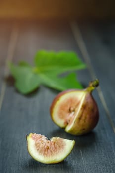 Portion of fresh Figs on wooden background