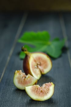 Portion of fresh Figs on wooden background