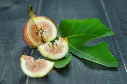 Portion of fresh Figs on wooden background