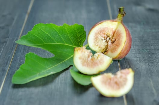 Portion of fresh Figs on wooden background