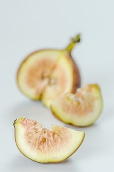 sliced fresh figs fruit on white background