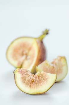 sliced fresh figs fruit on white background