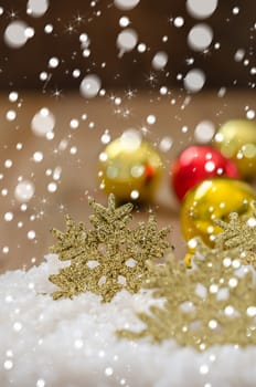 Christmas Decoration With Snow Over Wooden Background