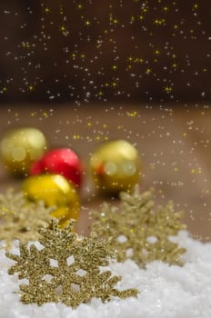 Christmas Decoration With Snow Over Wooden Background